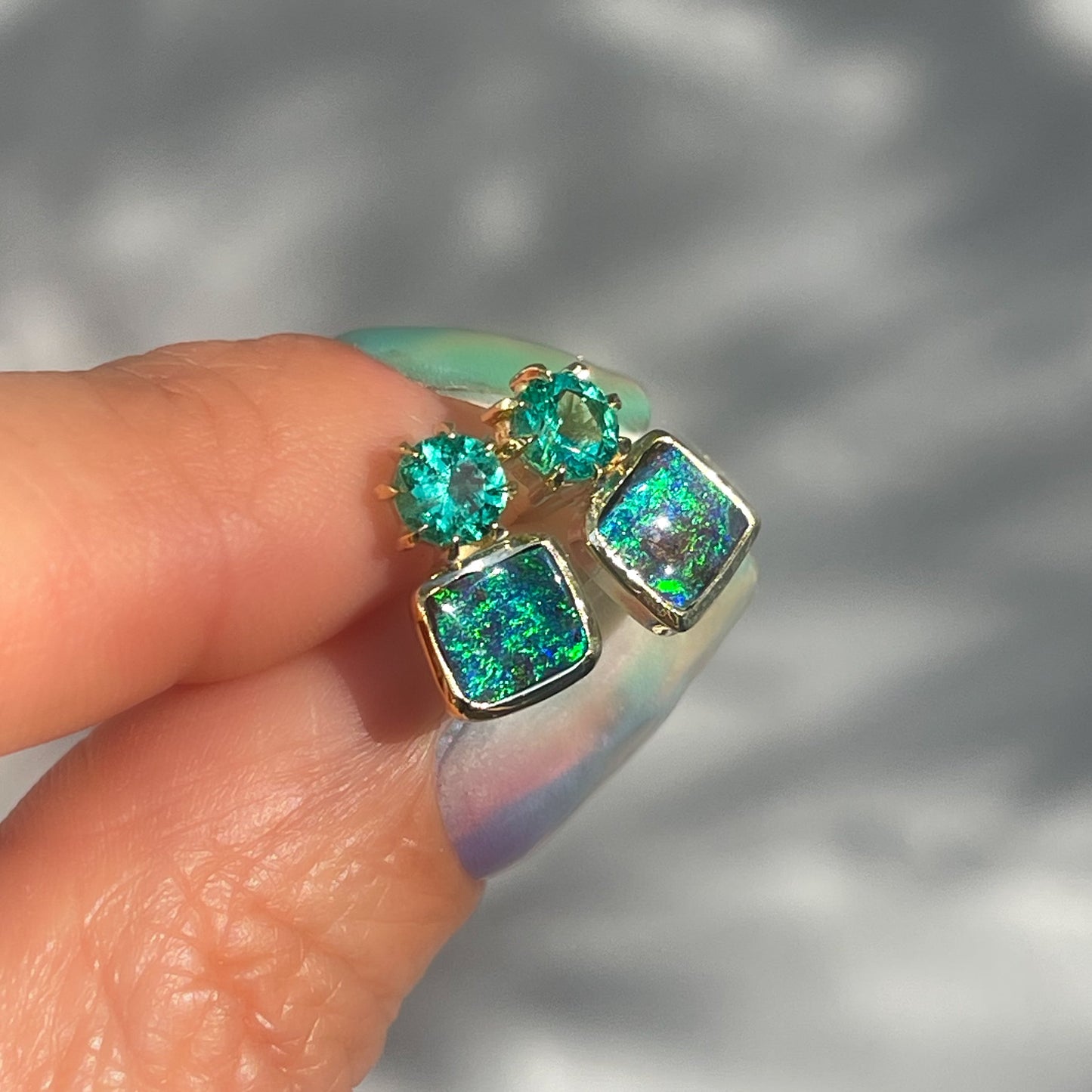 Australian Opal Earrings by NIXIN Jewelry. Opal stud earrings with green opal and emerald.