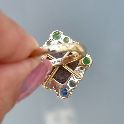 View of the back of an Australian Opal Ring by NIXIN Jewelry. Image shows the location of the secret engraving.