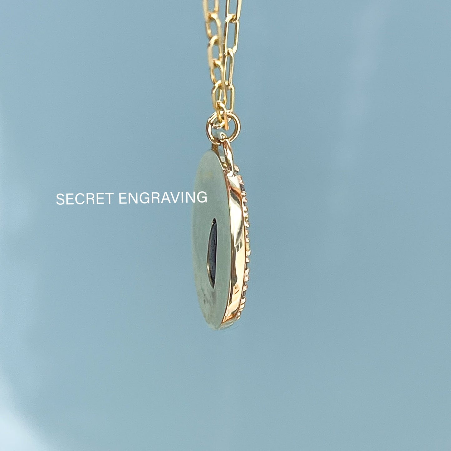 Profile of an Australian Opal Necklace by NIXIN Jewelry that blends the natural beauty of boulder opal with a halo of sapphires. This gold opal necklace represents the brand’s dedication to creating rare opal jewelry for collectors and connoisseurs.