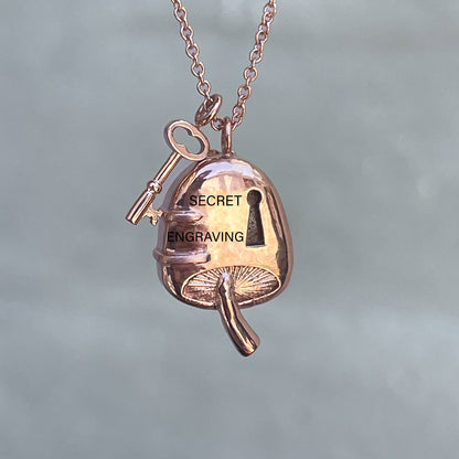 The back of an Australian Opal Necklace by NIXIN Jewelry. Image shows the rose gold opal necklace and location of its secret engraving.