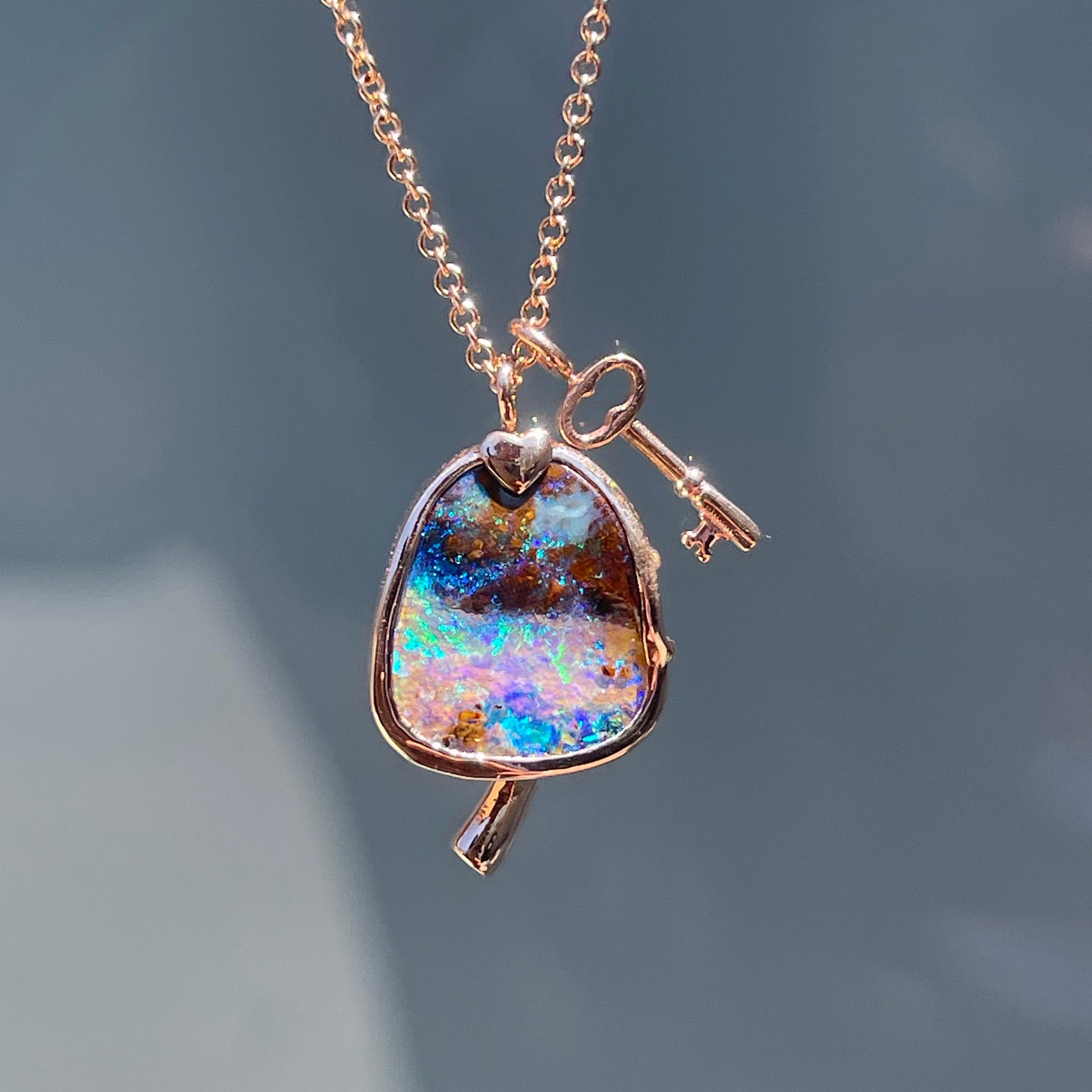 An Australian Opal Necklace by NIXIN Jewelry in 14k rose gold with a Boulder Opal.