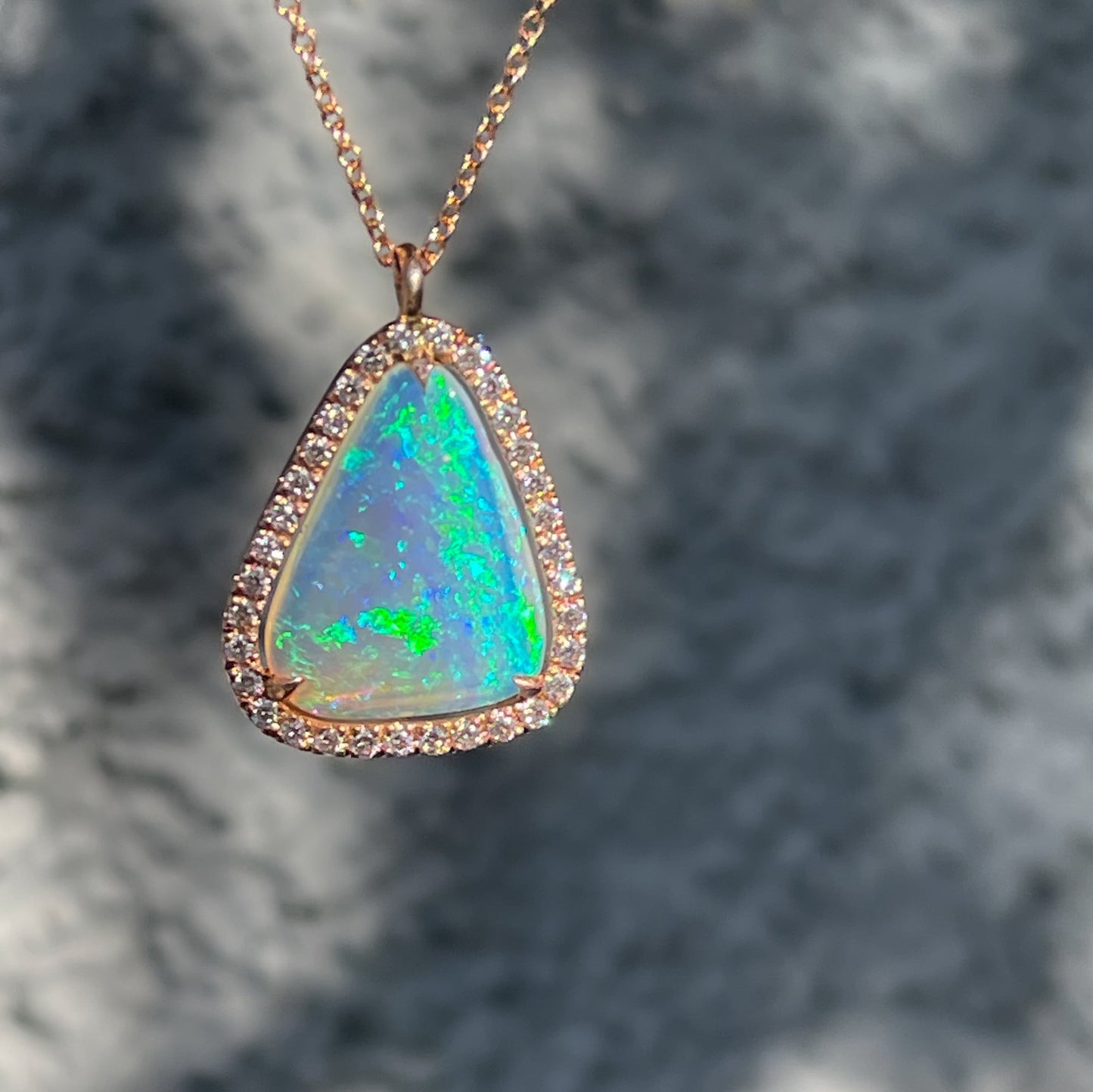 An Australian Opal Necklace by NIXIN Jewelry. A green opal necklace made with a real opal.