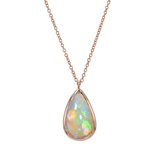An Australian Opal Necklace by NIXIN Jewelry with a Crystal Opal set in rose gold.