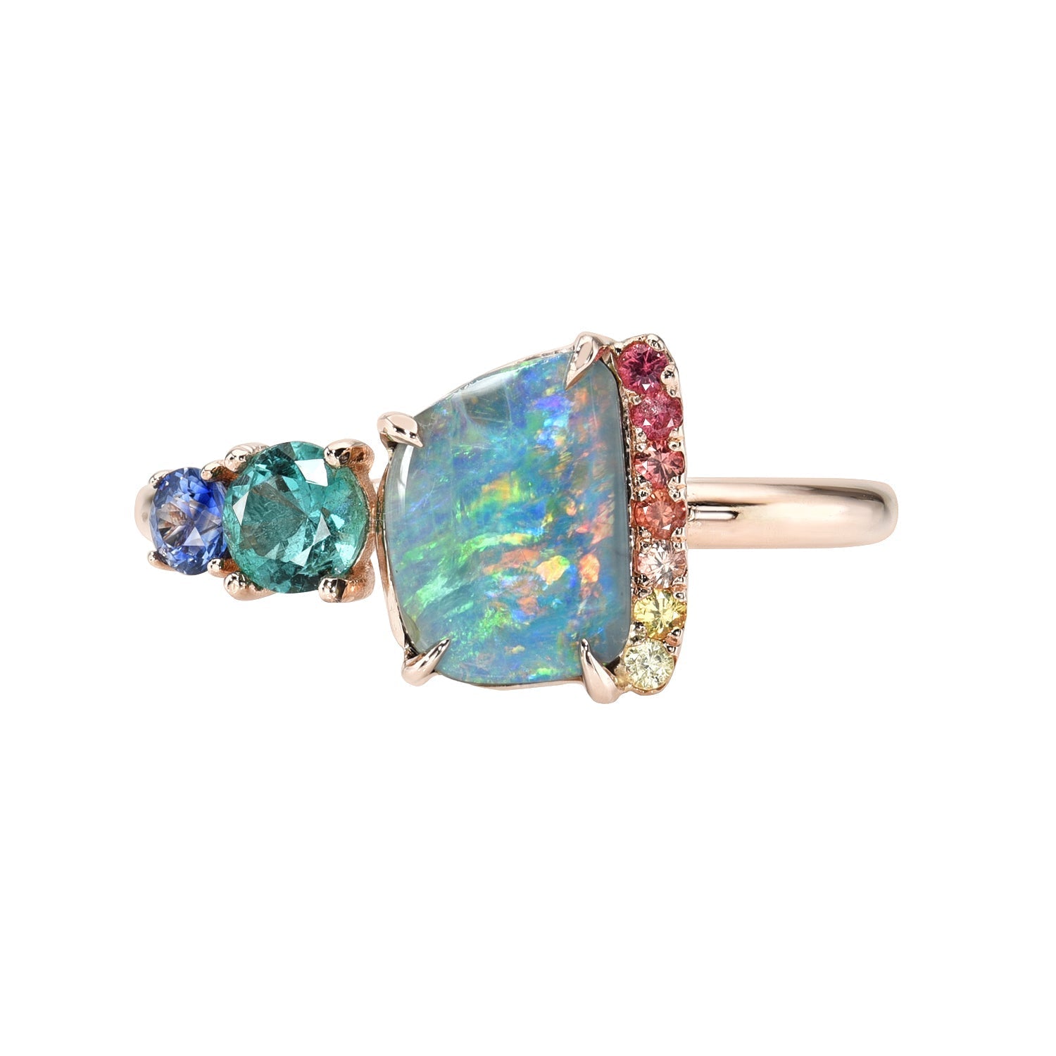 An Australian Opal Ring by NIXIN Jewelry. An opal and emerald ring in 14k rose gold.