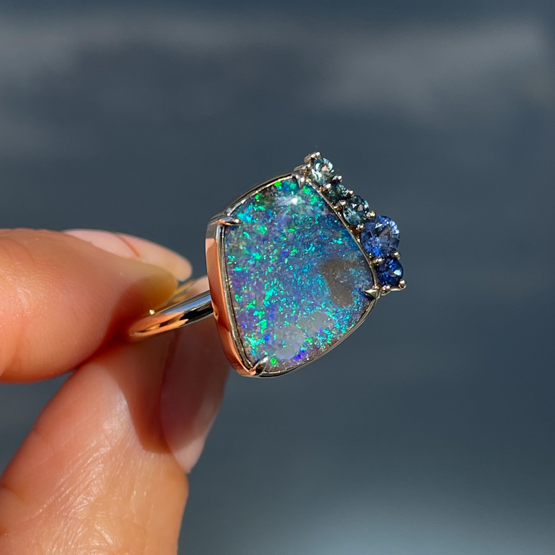 An Australian Opal Ring by NIXIN Jewelry. Luxury jewelry for lovers of Australian opals and sapphires.