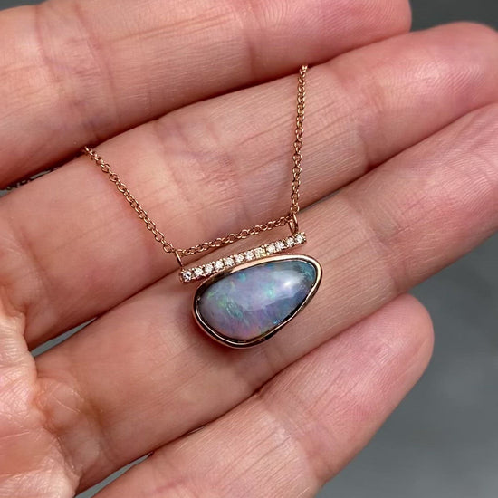 Video of rose gold opal necklace by NIXIN Jewelry
