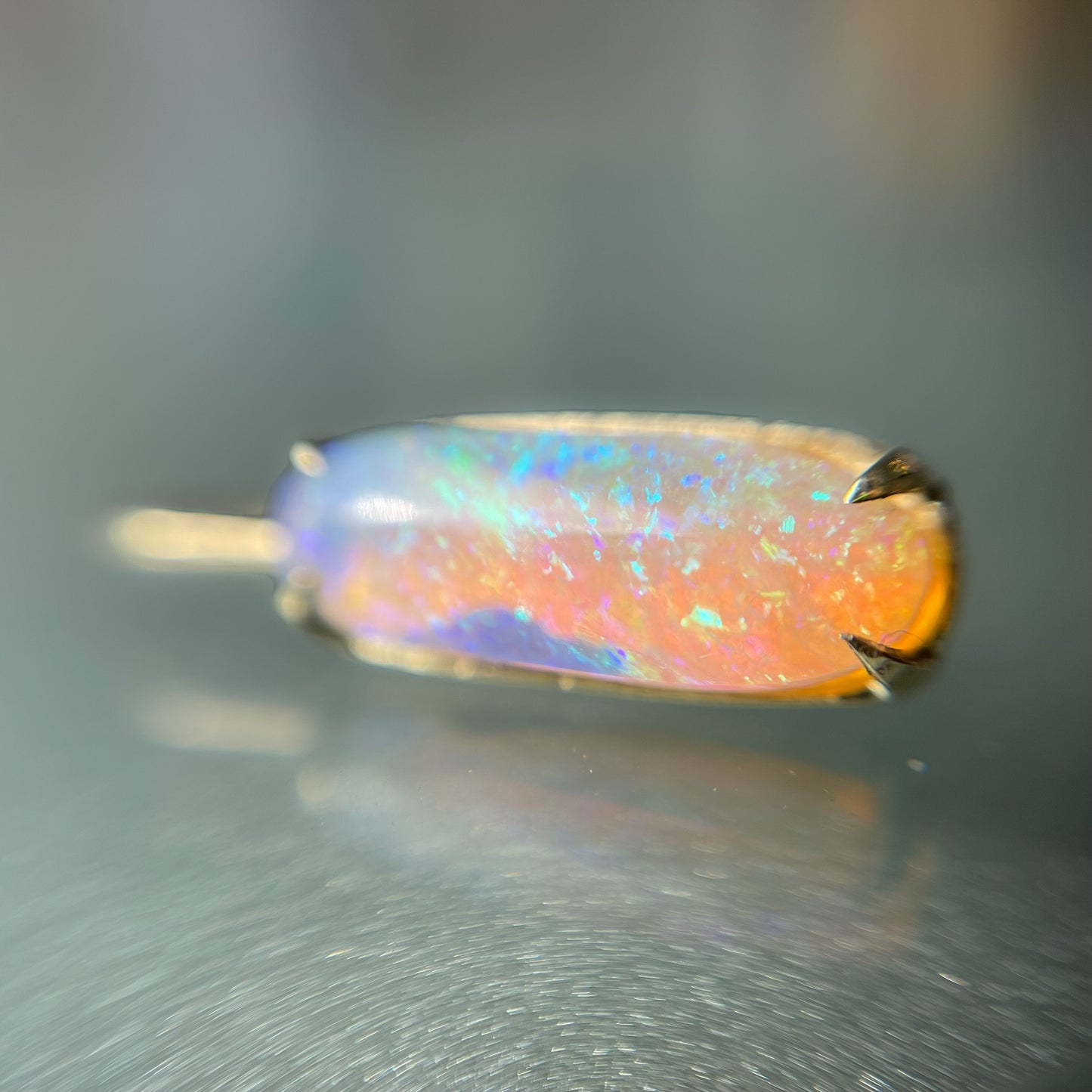 Close up of crystal opal drop earrings by NIXIN Jewelry