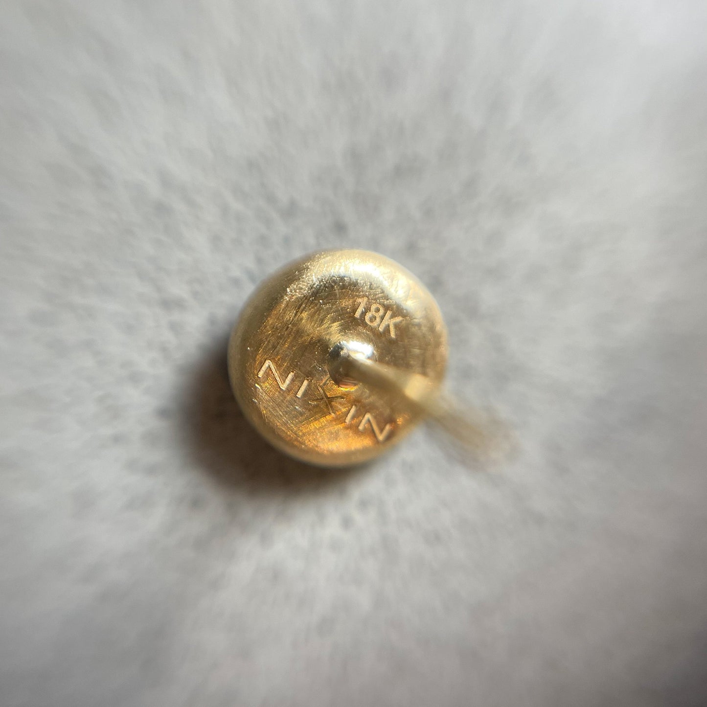 Back view of 18k gold earrings studs by NIXIN Jewelry