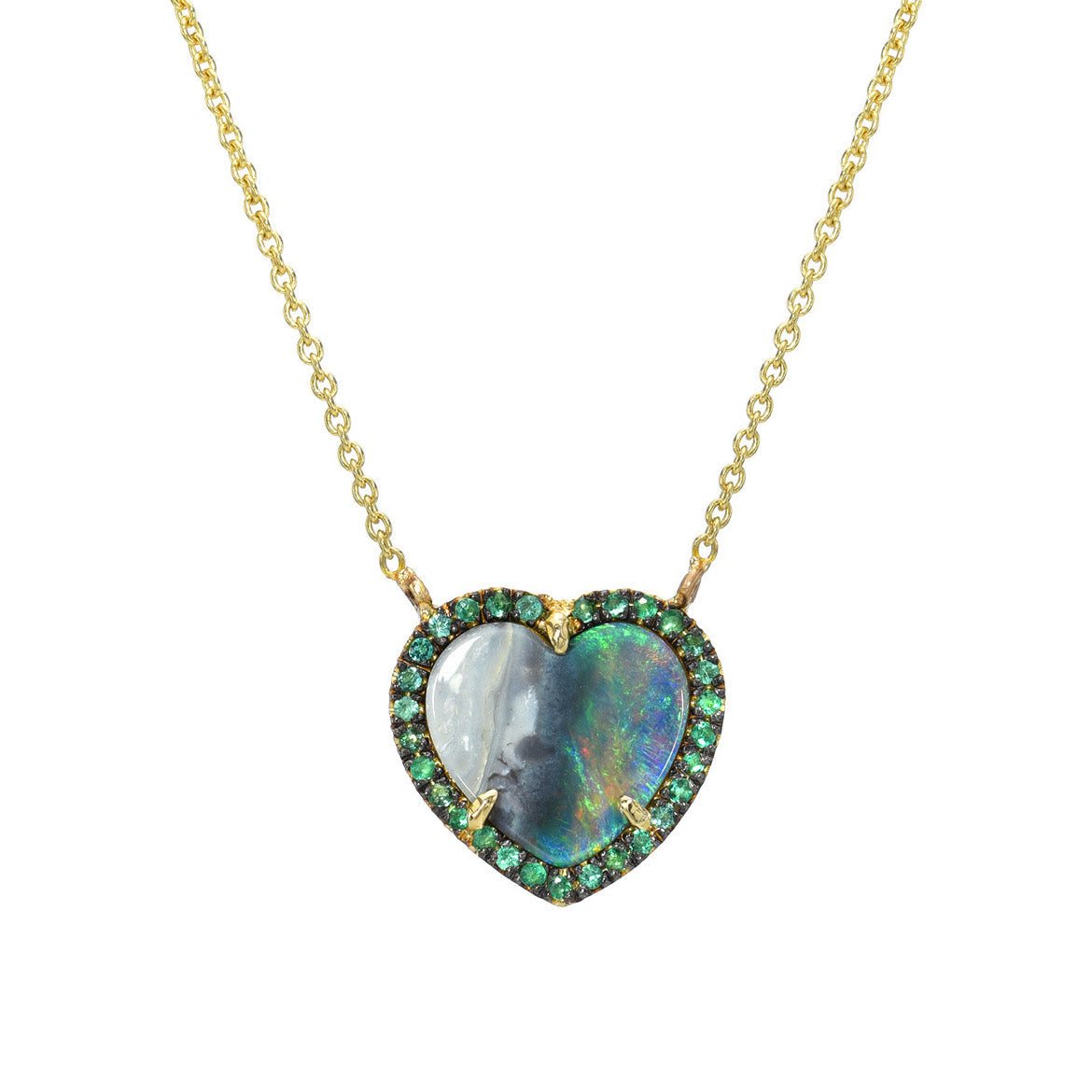 An Australian Opal Heart Necklace by NIXIN Jewelry in front of a white backdrop.