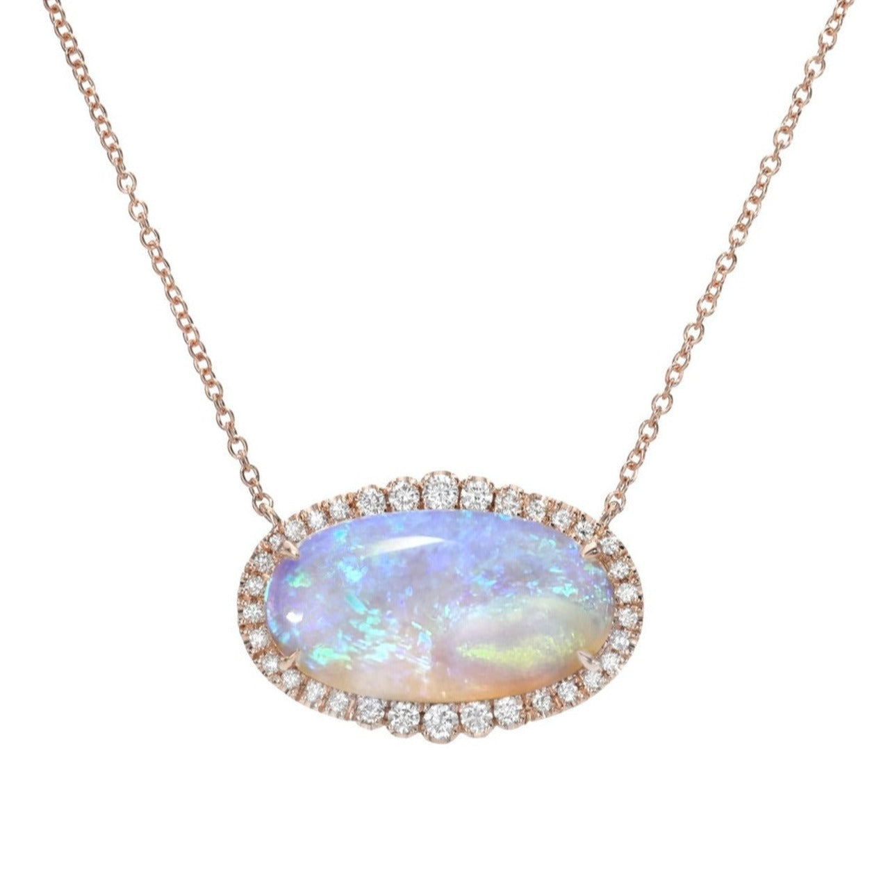 An Australian Opal Necklace by NIXIN Jewelry shot against a white backdrop. An opal and diamond necklace set in 14k rose gold.