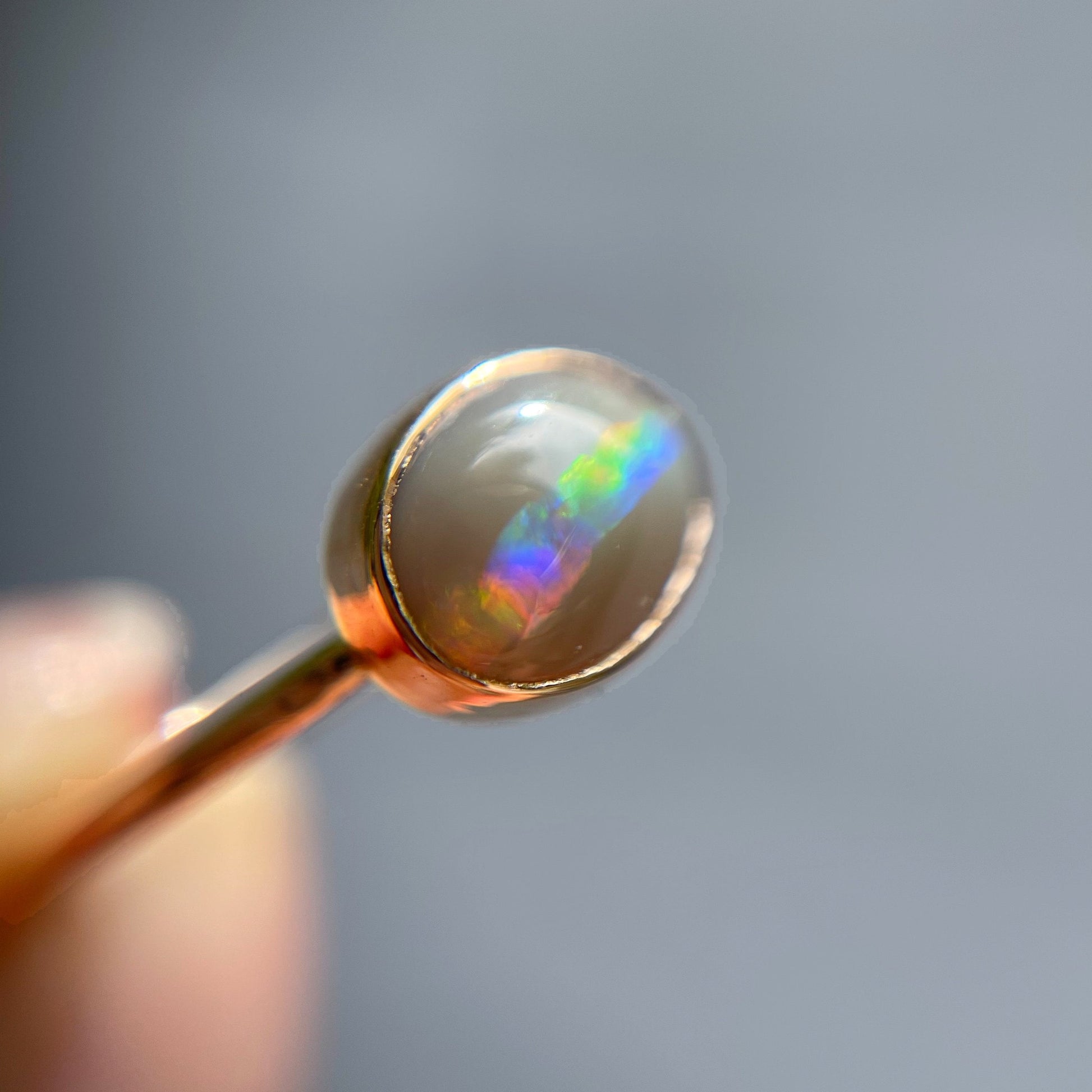 Close up of semi black opal ring by NIXIN Jewelry