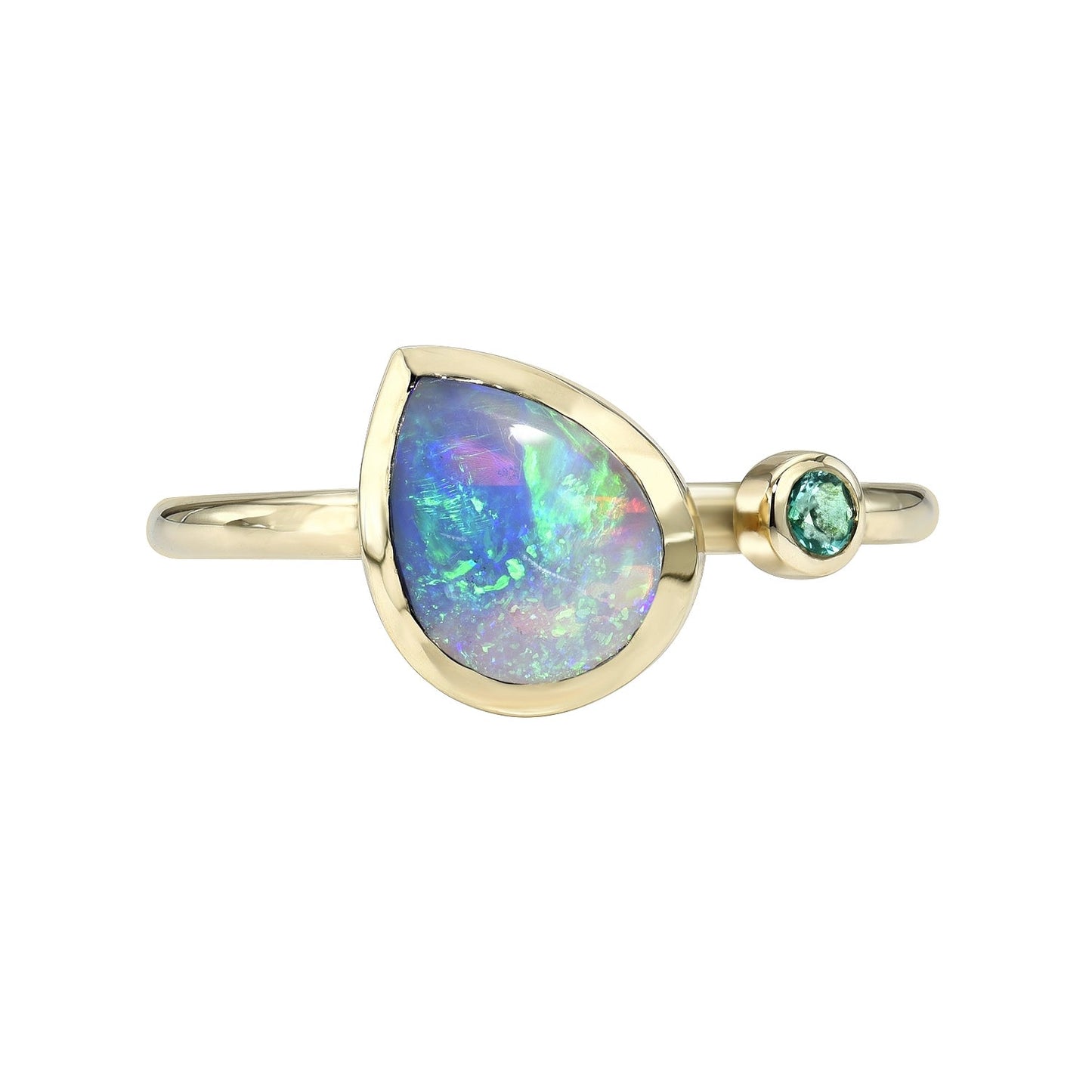 An Australian Opal Ring by NIXIN Jewelry against a white backdrop featuring a Black Opal and an emerald.