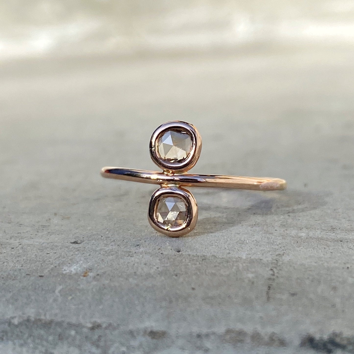 Paleo Double Diamond Slice Rose Gold Ring in soft daylight