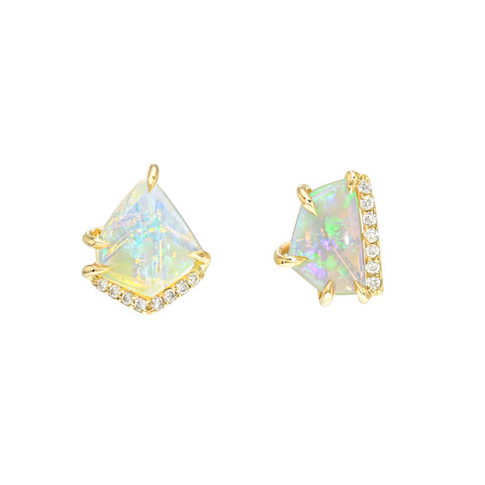Australian Opal Earrings by NIXIN Jewelry are presented on a white studio background, displaying mismatched opal stud earrings. These luxury designer earrings are a fusion of jewelry art and geometry, featuring irregular-cut natural crystal opals and brilliant-cut diamond accents set in solid 14k gold.
