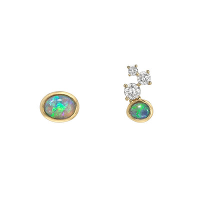 Australian Opal Earrings by NIXIN Jewelry. These unique opal earrings are 14k gold mismatched earrings featuring black crystal opals and opal diamond accents. Shop this luxury jewelry collection of opal studs and unique fine jewelry for sale.