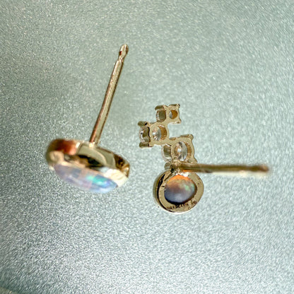 Australian Opal Earrings by NIXIN Jewelry. Back view of the 14k gold opal studs, showing the secure construction and the NIXIN maker's mark. These black opal jewelry pieces offer exceptional quality in australian opal jewelry.