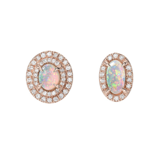 A pair of Australian Opal Earrings by NIXIN Jewelry with opals and diamonds set in rose gold.
