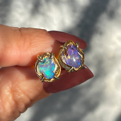 A pair of Australian Opal Earrings by NIXIN Jewelry. Opal stud earrings made in 14k gold.