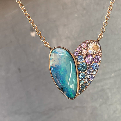 A Heart Opal Necklace by NIXIN Jewelry with assorted colored gems and a Boulder Opal.