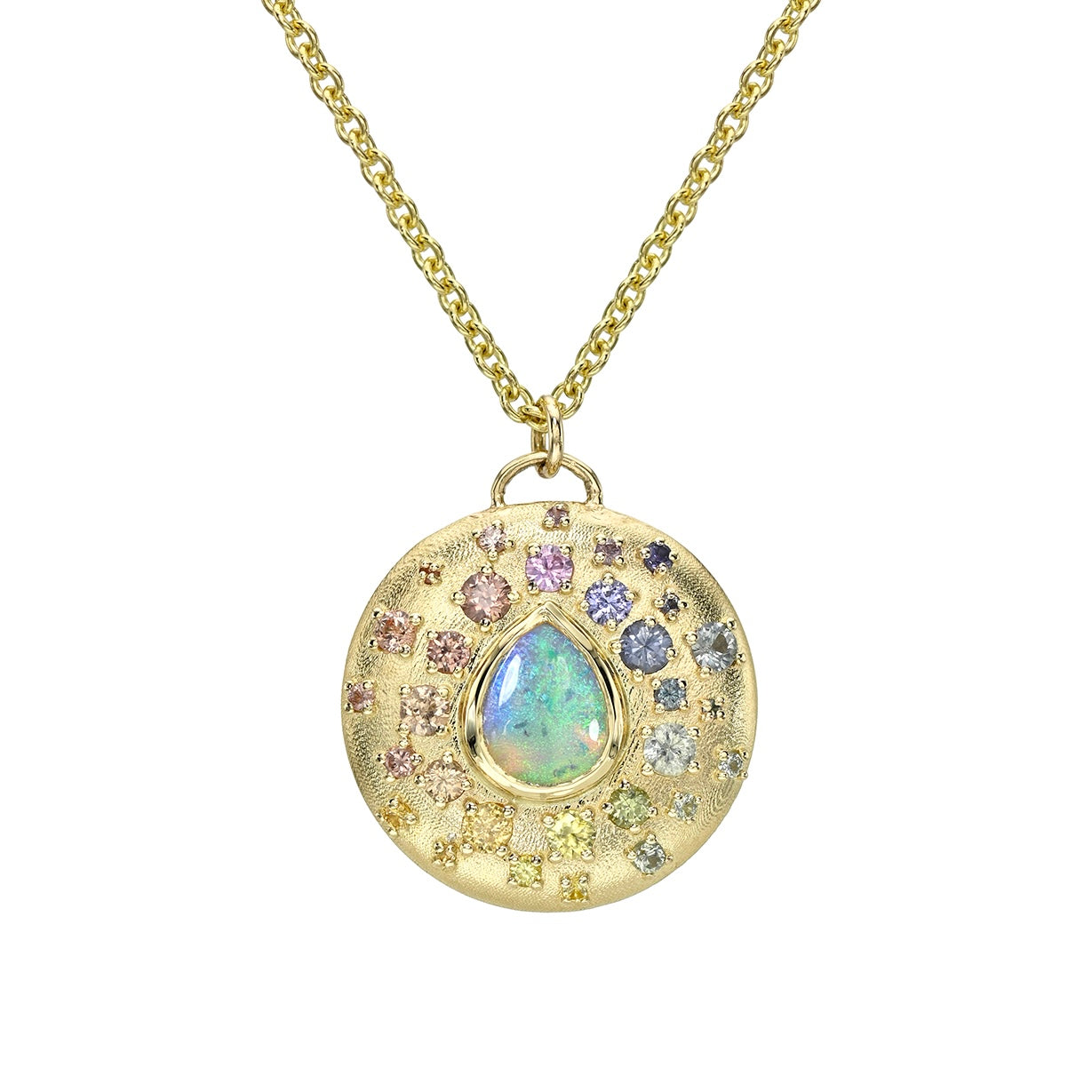 An Australian Opal Necklace by NIXIN Jewelry features a radiant gold disc pendant. This modern opal necklace showcases a brilliant crystal opal in a secure bezel setting.