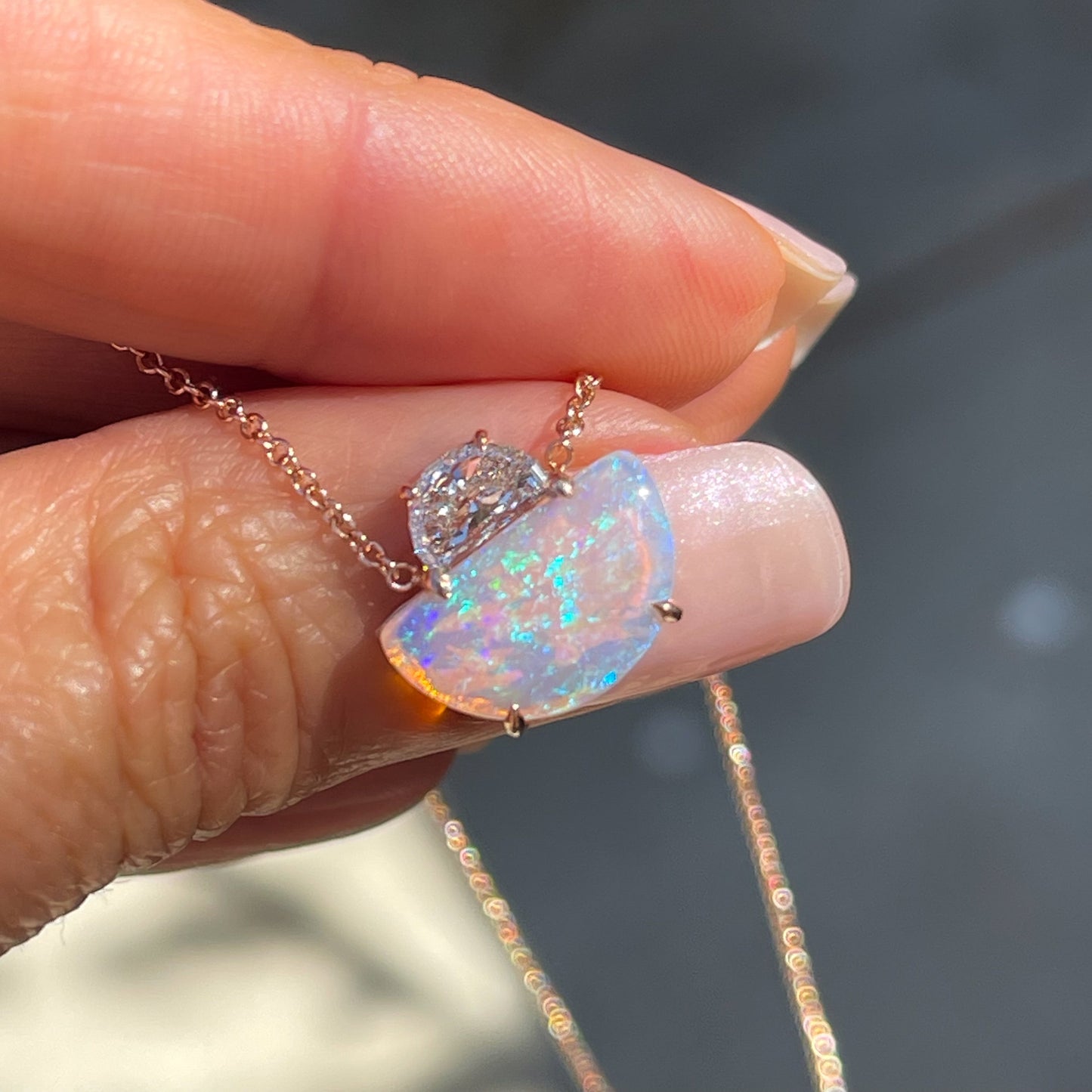 An Australian Opal Necklace by NIXIN Jewelry. A rose gold opal necklace. 