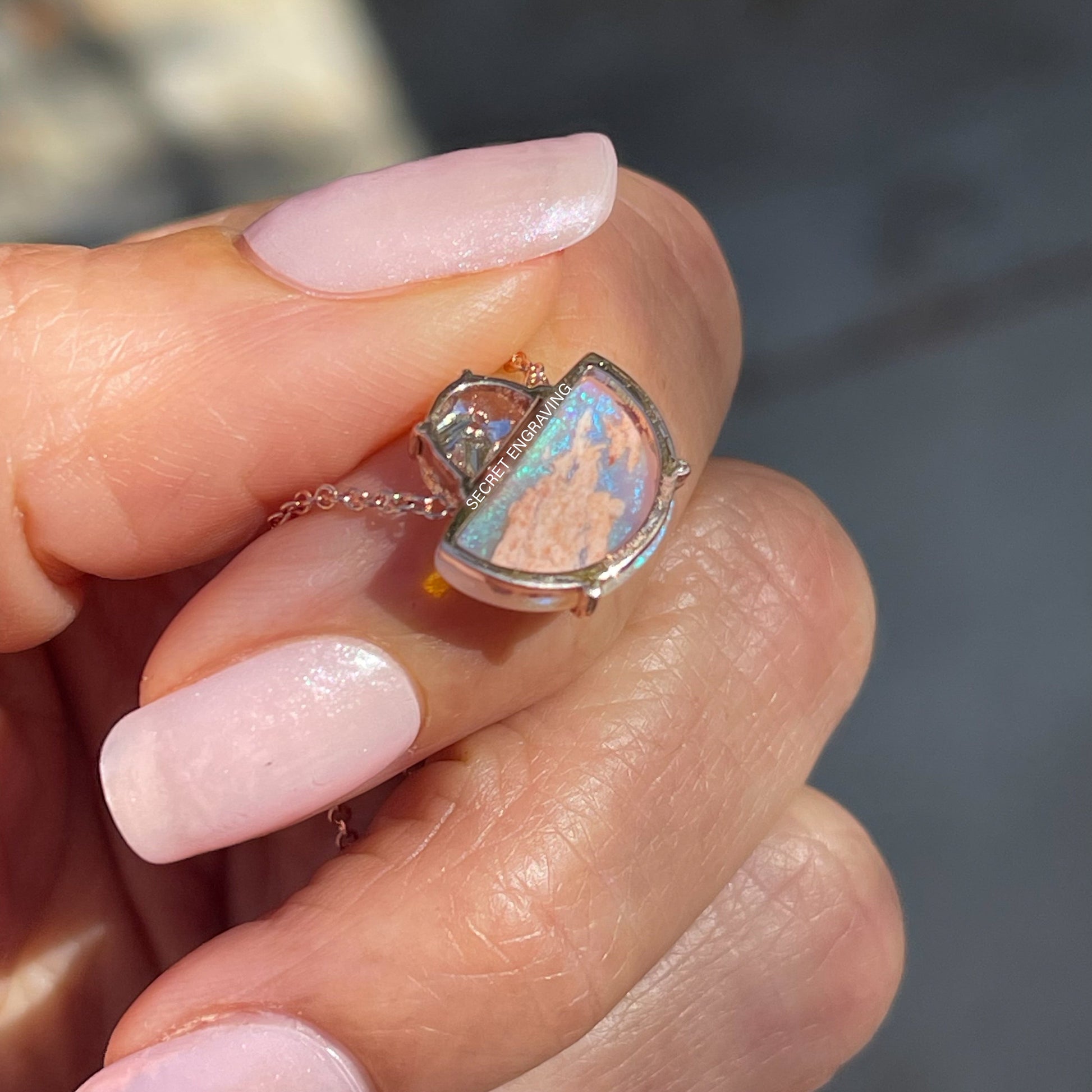 The back of an Australian Opal Necklace by NIXIN Jewelry. Shows location of a secret engraving.