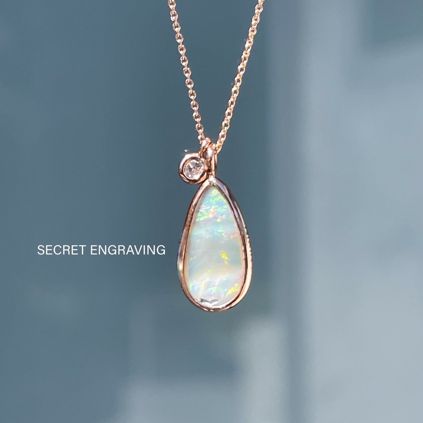 Back of an Australian Opal Necklace by NIXIN Jewelry showing location of the secret engraving.