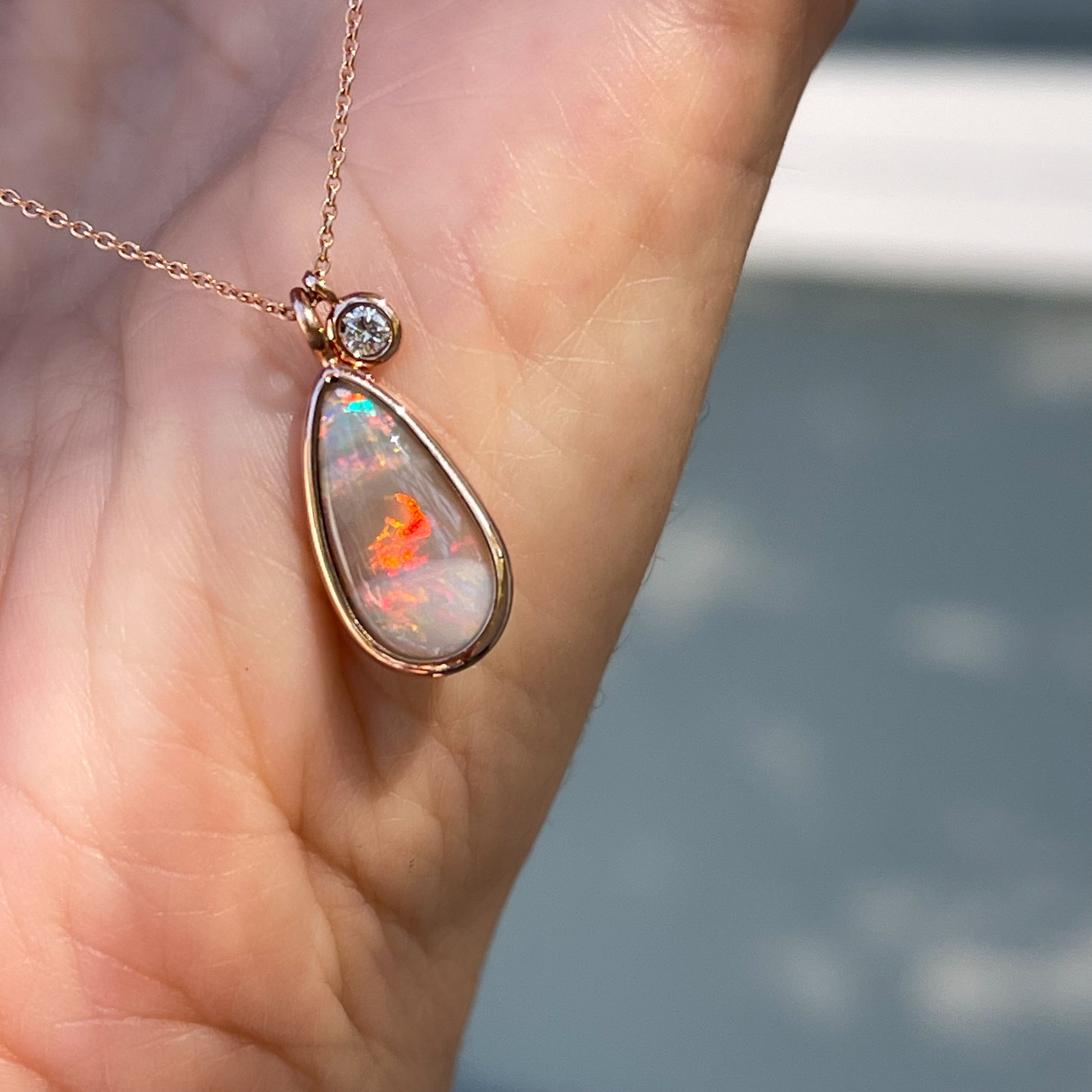 An Australian Opal Necklace by NIXIN Jewelry. Rare opal jewelry with red fire.