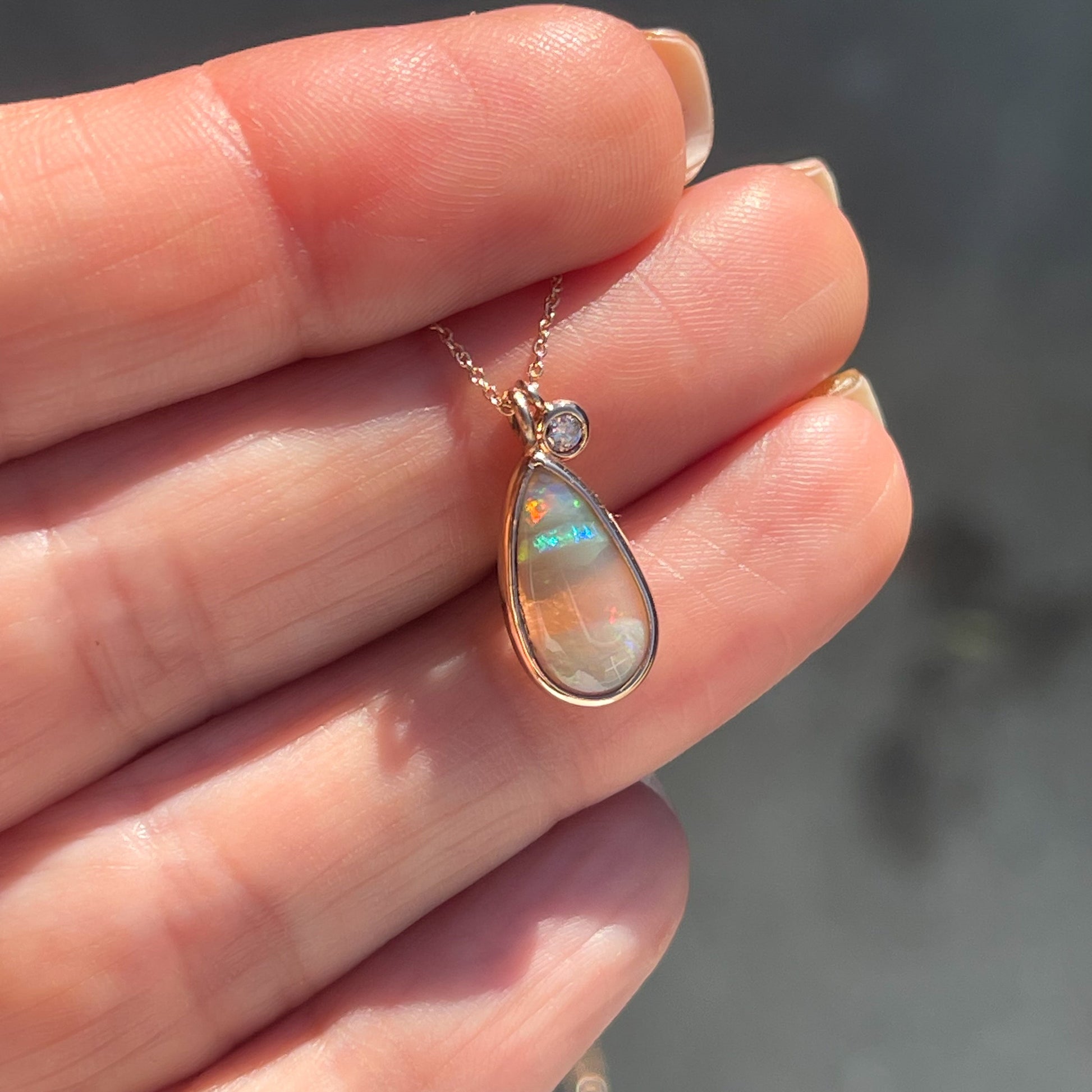 An Australian Opal Necklace by NIXIN Jewelry. A rose gold opal necklace.