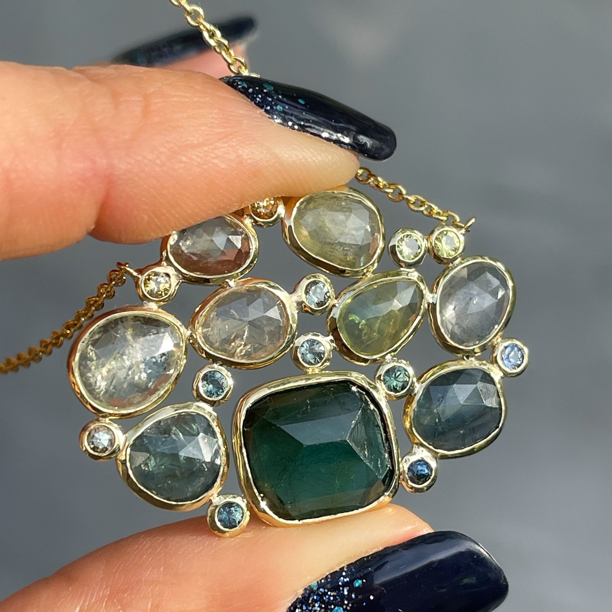  A Tourmaline and Sapphire Necklace by NIXIN Jewelry with blue green sapphires.