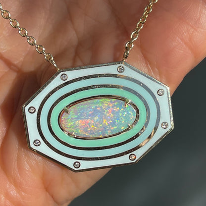 An Australian Opal Necklace by NIXIN Jewelry. A luxury necklace with a crystal opal set in yellow gold.