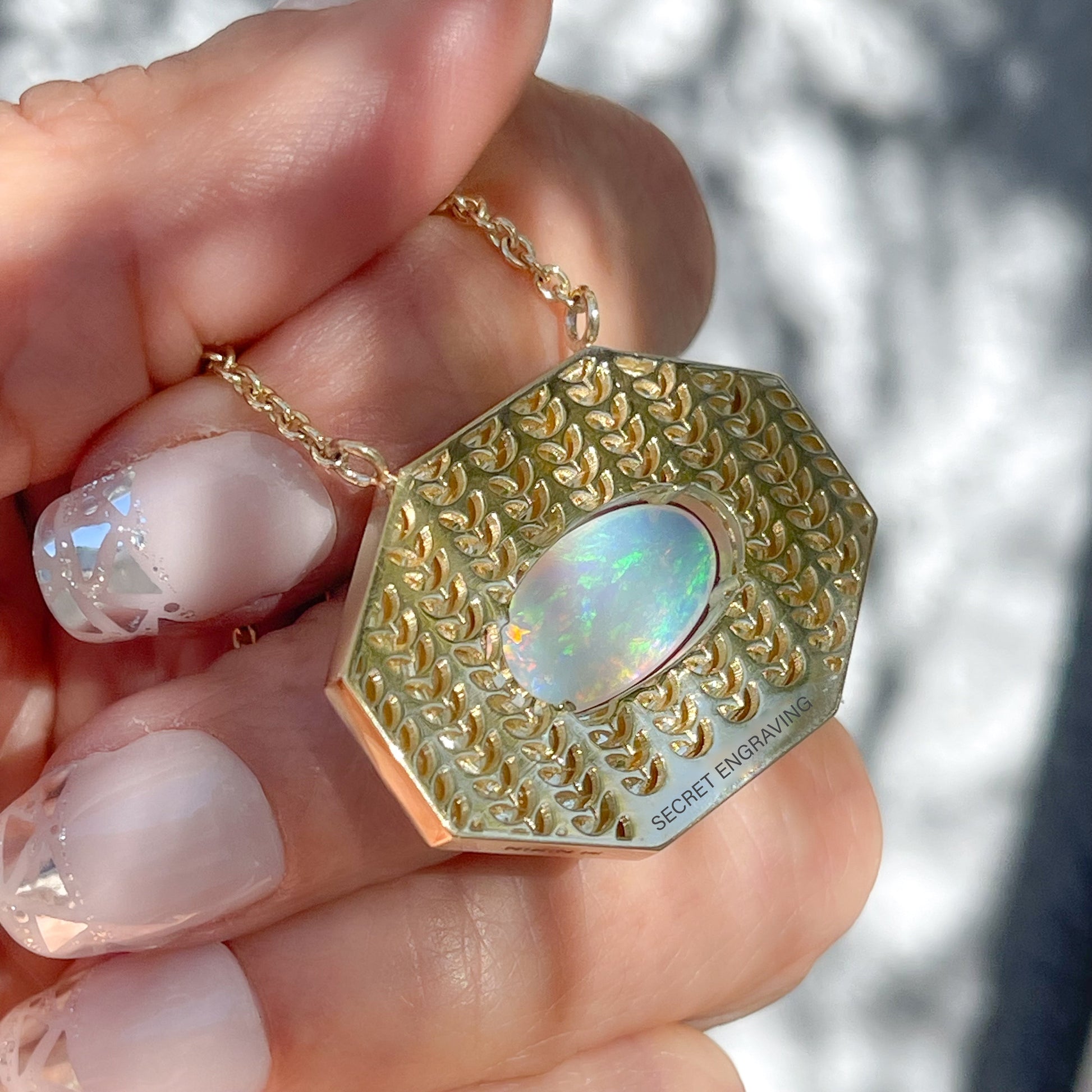 Back view of an Australian Opal Necklace by NIXIN Jewelry. A gold opal necklace with a natural opal at center.