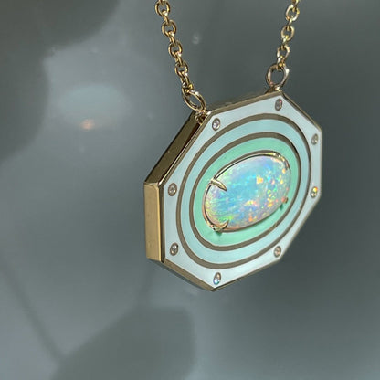 Side view of an Australian Opal Necklace by NIXIN Jewelry. Shows the opal pendant edge and the prong setting of the crystal opal.