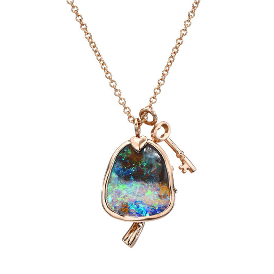 An Australian Opal Necklace by NIXIN Jewelry with a Boulder Opal set in rose gold.