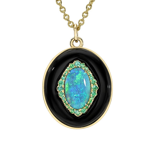 An Australian Opal Necklace by NIXIN Jewelry with a Crystal Opal and an emerald halo set in 14k gold.