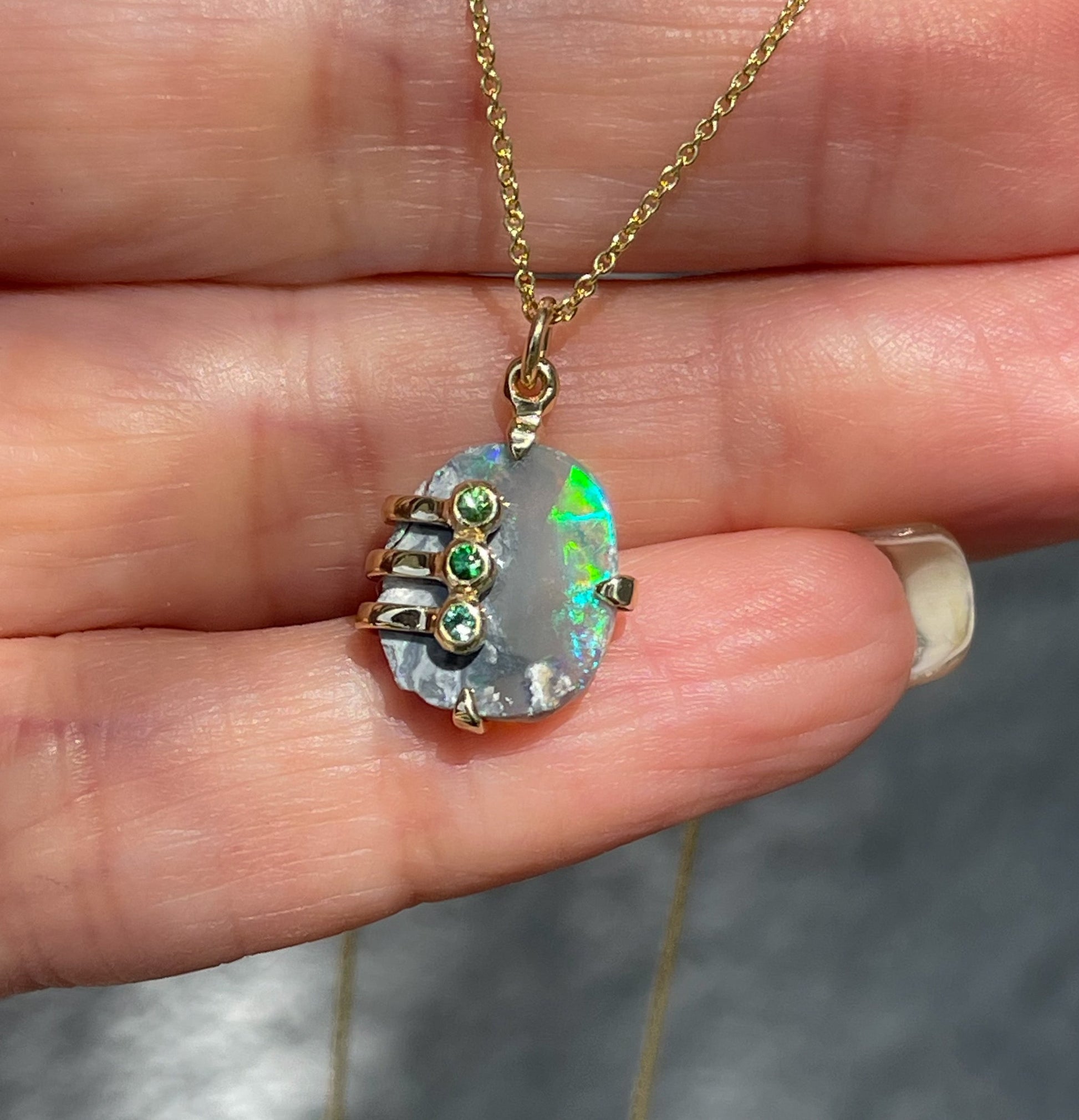 An Australian Opal Necklace by NIXIN Jewelry with a Black Opal. One of a kind opal jewelry.
