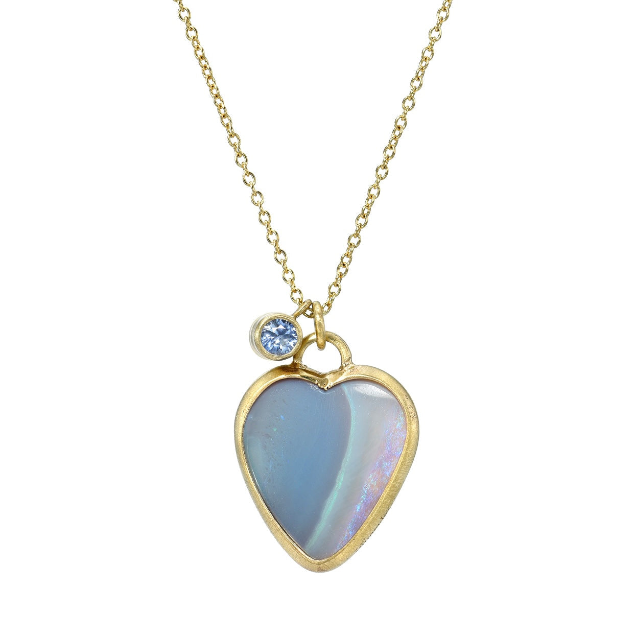 A reversible Australian Opal Necklace by NIXIN Jewelry with a heart shaped opal from Lightning Ridge.