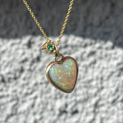 An Australian Opal Necklace by NIXIN Jewelry. The opal pendant necklace is made with a Lightning Ridge Opal.