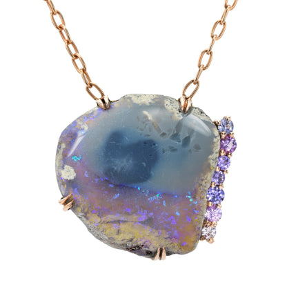 An Australian Opal Necklace by NIXIN Jewelry with a Black Opal set in rose gold.