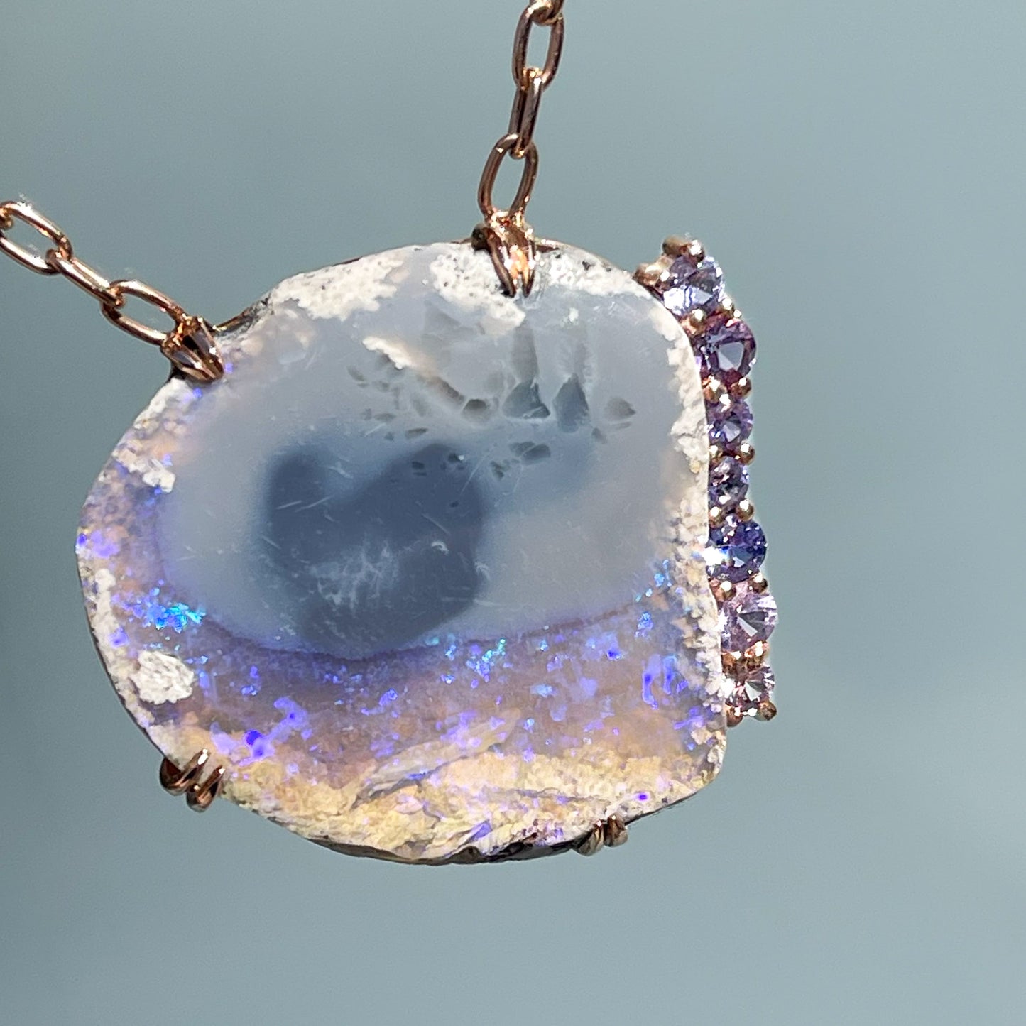 An Australian Opal Necklace by NIXIN Jewelry. A unique opal necklace with purple sapphires.