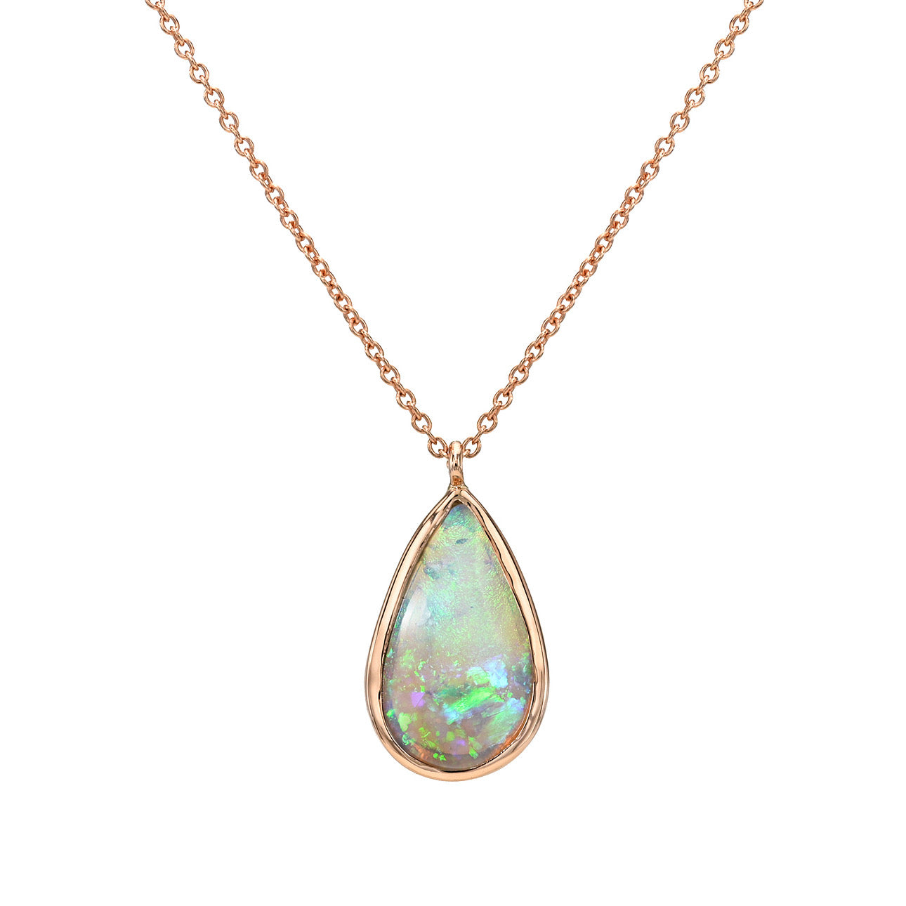 An Australian Opal Necklace by NIXIN Jewelry featuring the Unicorn Tear opal pendant in a clean studio shot. This luxury necklace showcases the green and blue fire of a genuine natural opal in a simple bezel setting. This unique opal necklace is jewelry art for collectors seeking rare opal jewelry.