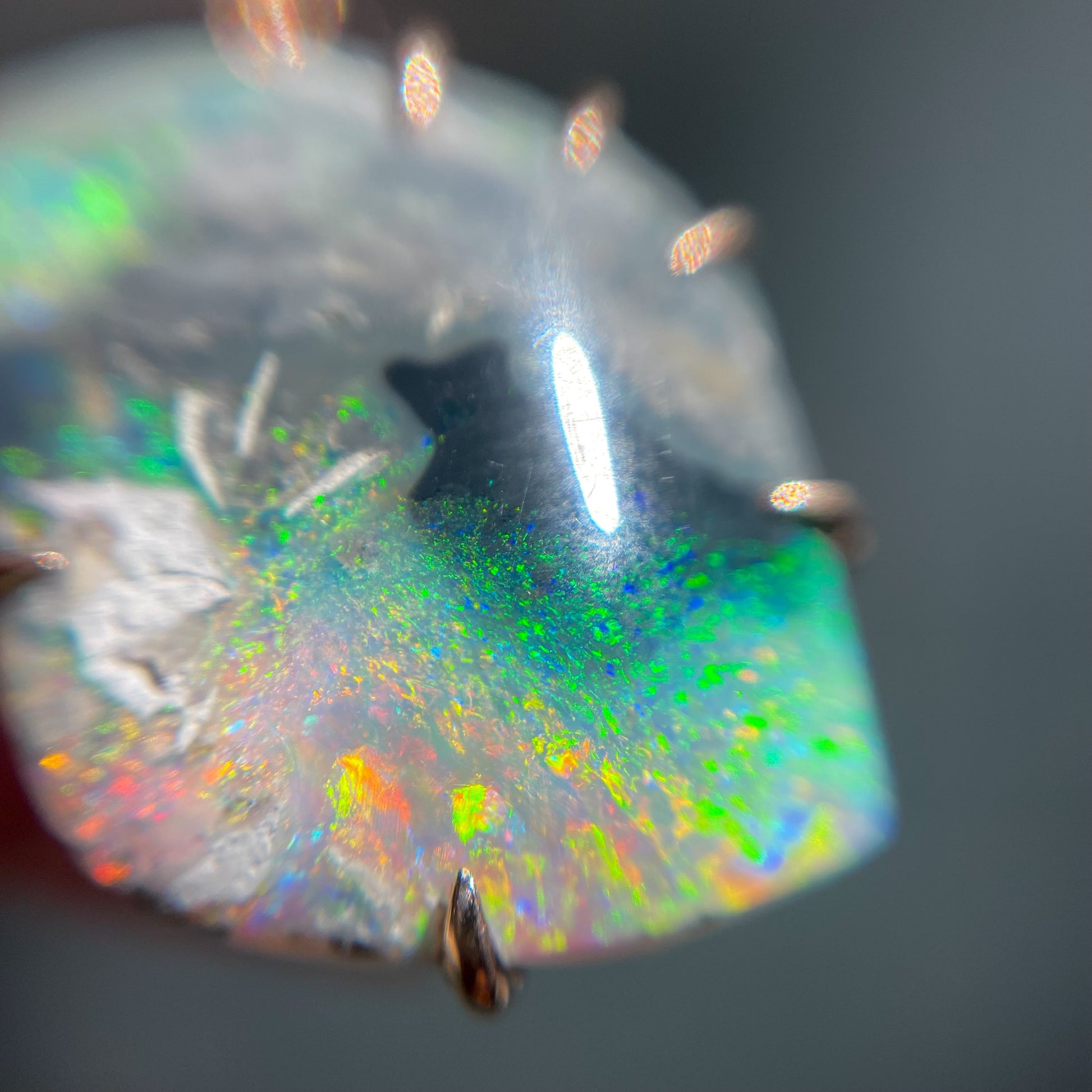 Close up of an Australian Opal Necklace. Rare opal jewelry with a rough Black Opal.