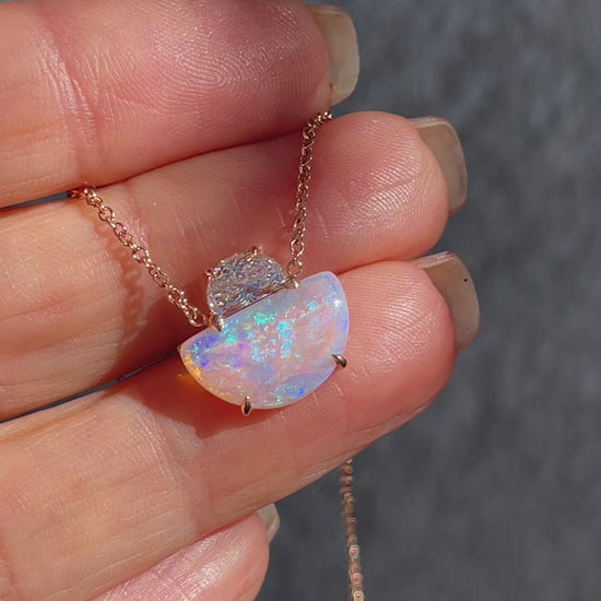 Video of an Australian Opal Necklace by NIXIN Jewelry. An opal pendant from the collection of unique opal jewelry.