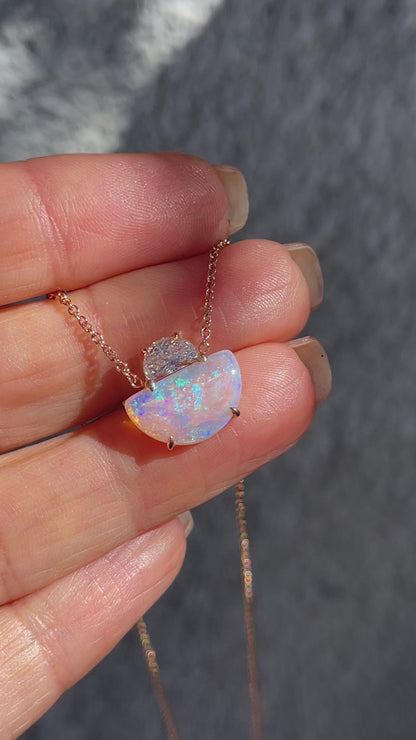 Video of an Australian Opal Necklace by NIXIN Jewelry. An opal pendant from the collection of unique opal jewelry.