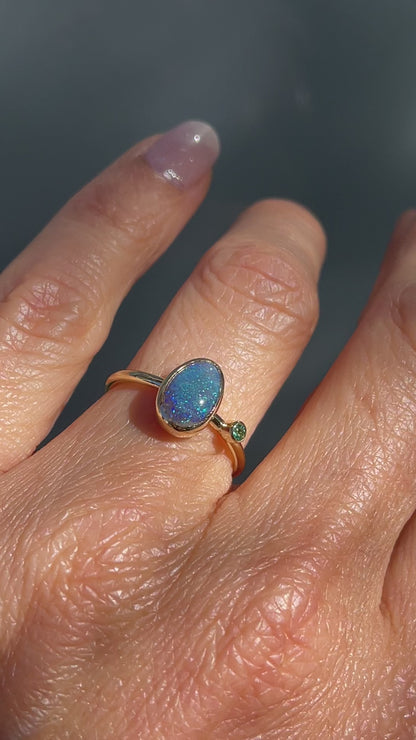 Video of an Australian Opal Ring by NIXIN Jewelry worn on a hand. A black opal ring from our selection of jewelry art.