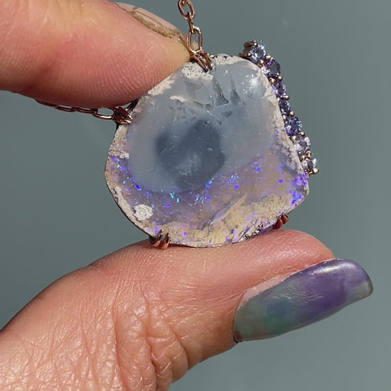 Video of an Australian Opal Necklace by NIXIN Jewelry. An opal and sapphire necklace.