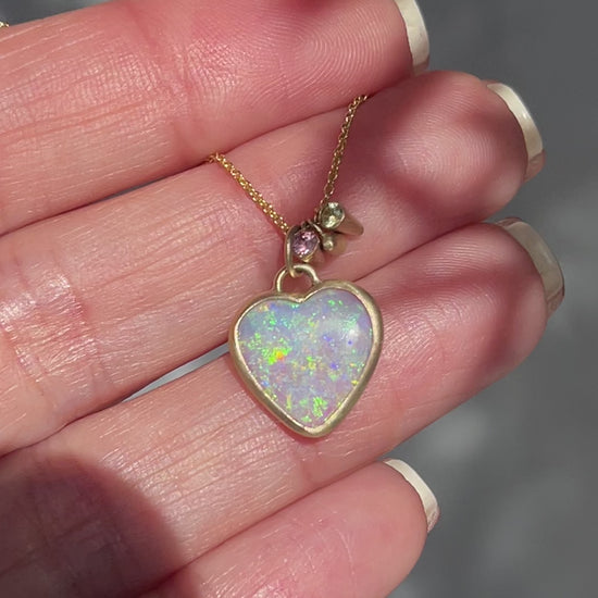 Video of an Australian Opal Necklace by NIXIN Jewelry showing both sides of the opal pendant.