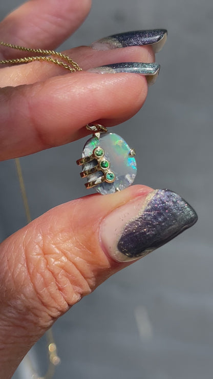 Video of an Australian Opal Necklace by NIXIN Jewelry. Shows the green flash of the opal pendant necklace. 