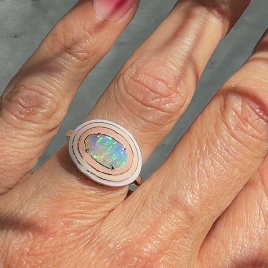 A video of an Australian Opal Ring by NIXIN Jewelry being rotated on a finger to show the fire and brilliance of the natural opal. This short clip highlights the unique opal jewelry's exquisite craftsmanship, making it a top choice for those looking for opal rings for sale.