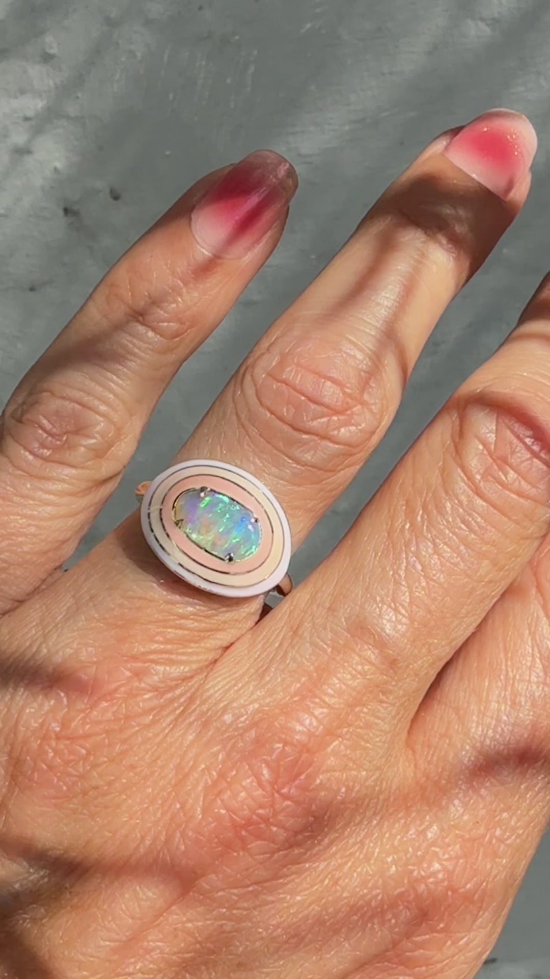 A video of an Australian Opal Ring by NIXIN Jewelry being rotated on a finger to show the fire and brilliance of the natural opal. This short clip highlights the unique opal jewelry's exquisite craftsmanship, making it a top choice for those looking for opal rings for sale.